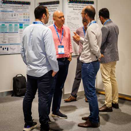 Yaman and Nikos exchanging ideas with Jonas Waefler from EWZ